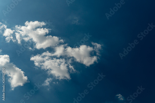 Beautiful blue sky with patchy white cloud on tropical weather in summer time background pattern. Skyscape background