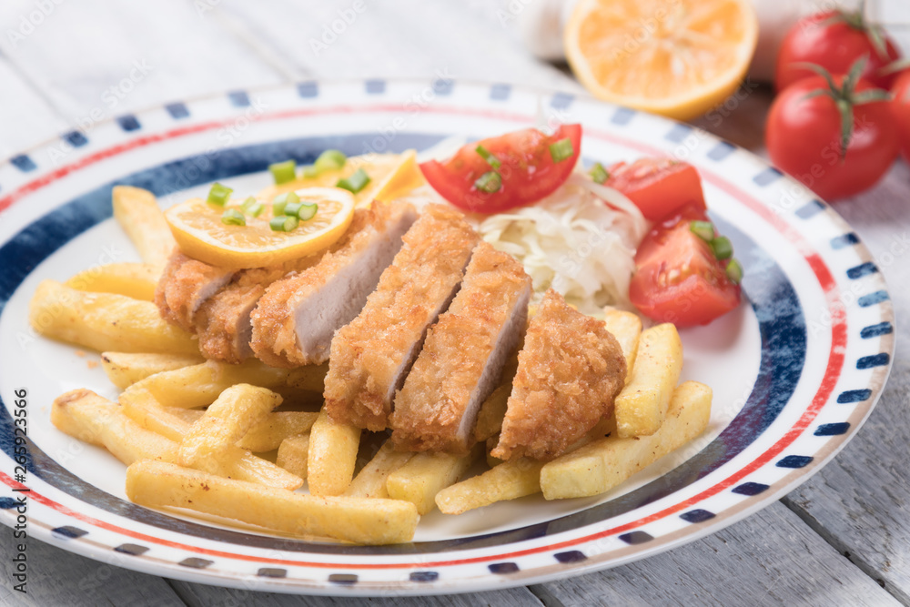 Breaded cutlet with french fries Breaded cutlet with french fries