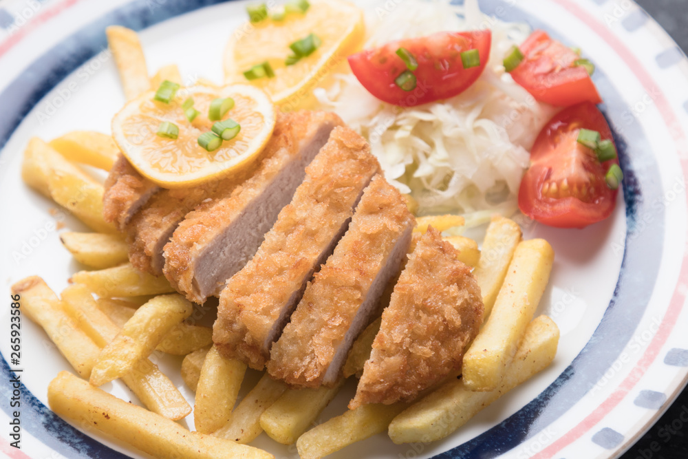 Breaded cutlet with french fries Breaded cutlet with french fries