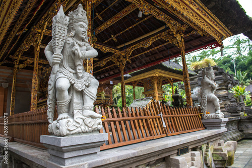 The Hindu shrine and demon guardian statue inside Tirta Empul temple (other name is holy spring water temple) in Bali, Indonesia.