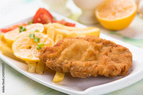 Breaded cutlet with french fries