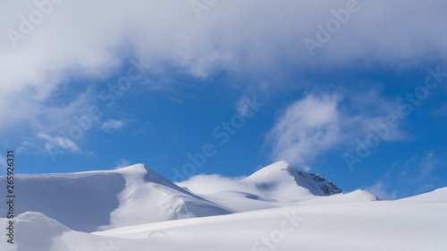 Image of a snow-capped mountain top. © PhotoBetulo