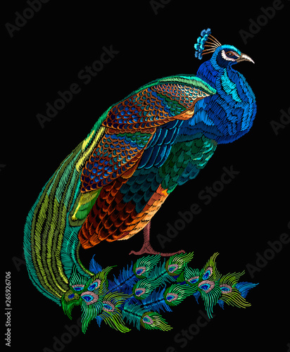 Embroidery peacock. Fashionable template for design of clothes. Hand drawn tropical bird