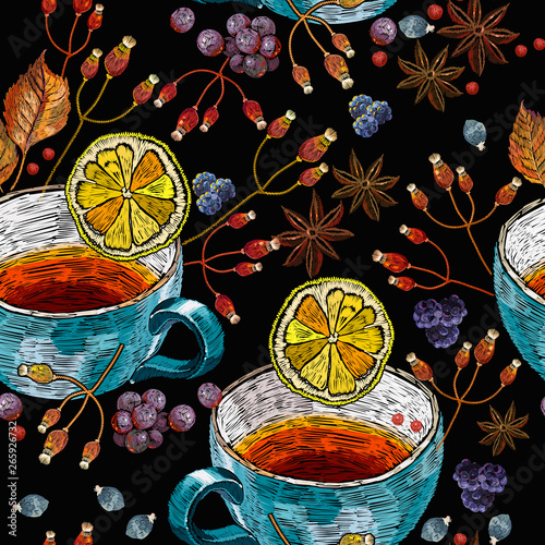 Embroidery cup of tea, carnation and wild berries seamless pattern. Fashion autumn art. Template for design of clothes, tapestry