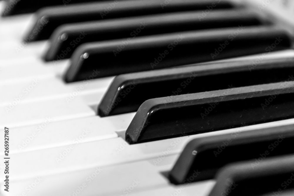 Piano keyboard background with selective focus Piano keyboard background with selective focus