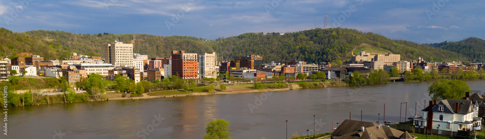 The Ohio River Meanders by Reflecting Buildings of Wheeling West Virginia The Ohio River Meanders by Reflecting Buildings of Wheeling West Virginia