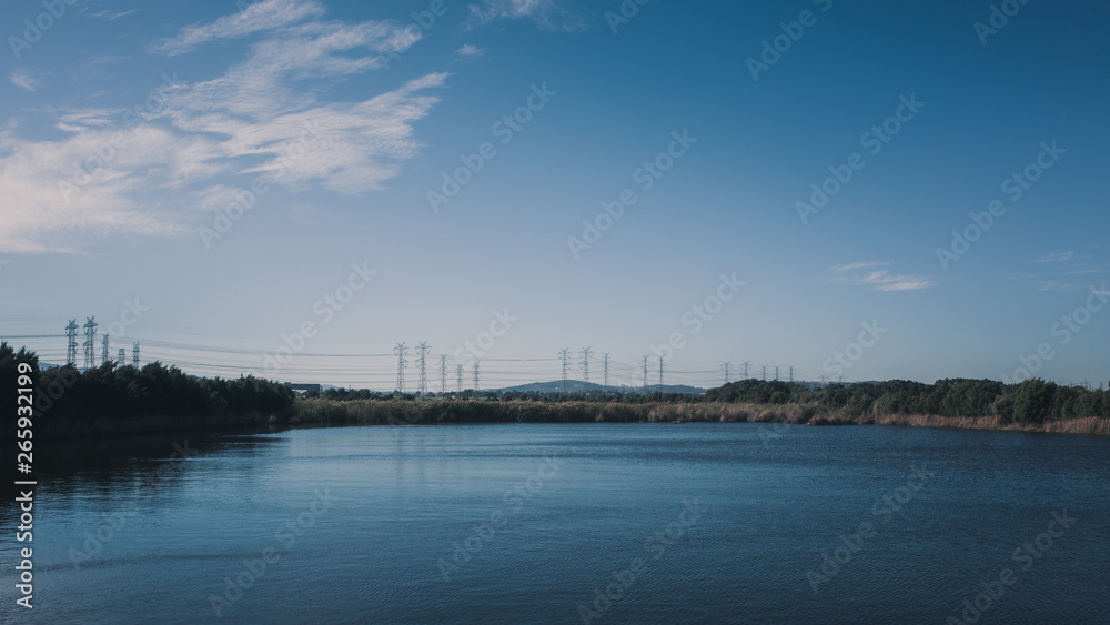 Landscape lake and powerlines
