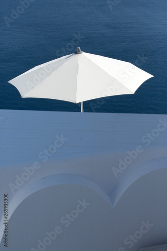 white umbrella against Blue of Sea
