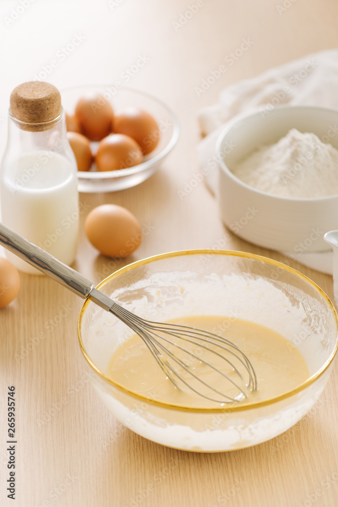 Ingredients and tools for baking sweet cake with banana and almonds Ingredients and tools for baking sweet cake with banana and almonds
