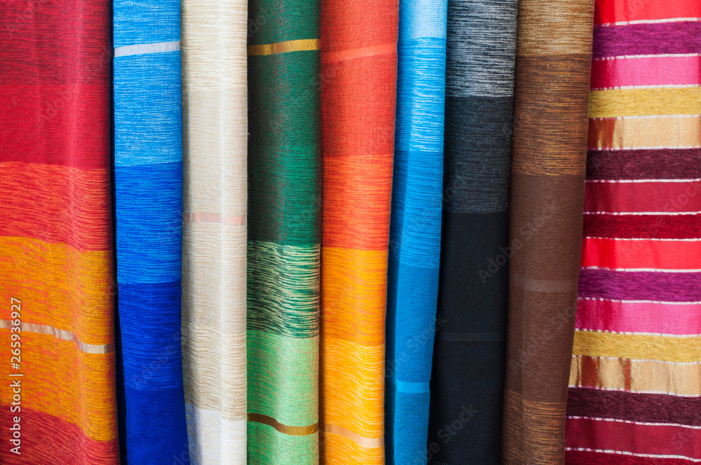 Various scarves of silk / Background of different colorful scarves of silk.