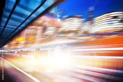 Motion blur of high speed train moving  on London photo