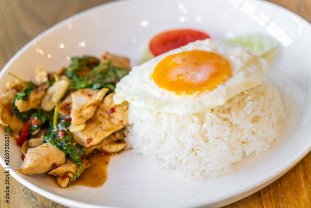 Basil Fried Chicken and fried egg with rice Basil Fried Chicken and fried egg with rice