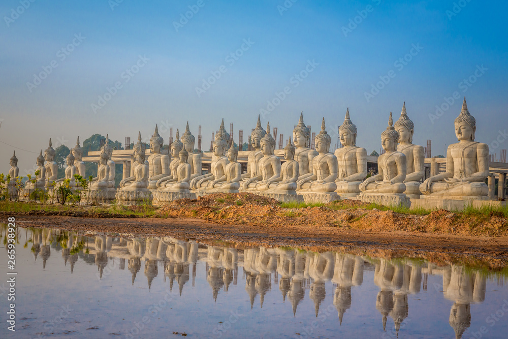 Fototapeta premium Big buddha statue landscape with clear sky, public in Nakhon si thammarat province, Thailand.