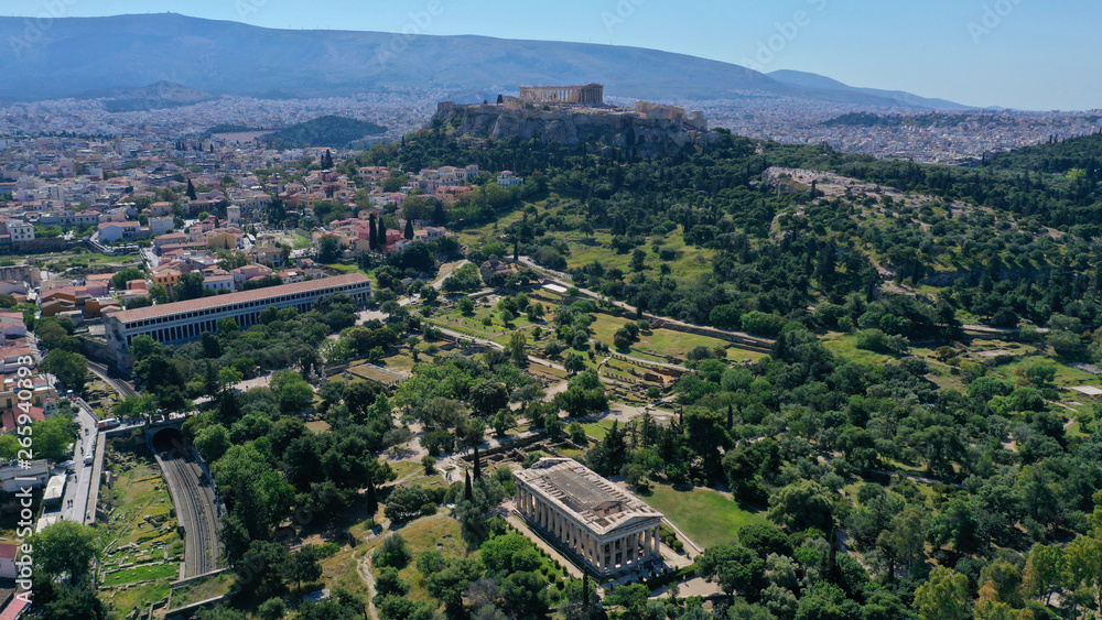 Aerial photo of iconic Ancient Forum a true masterpiece in the heart of ancient Athens featuring Temple of Hephaestus and iconic Stoa of Attalos in the slopes of Acropolis hill, Attica, Greece Aerial photo of iconic Ancient Forum a true masterpiece in the heart of ancient Athens featuring Temple of Hephaestus and iconic Stoa of Attalos in the slopes of Acropolis hill, Attica, Greece