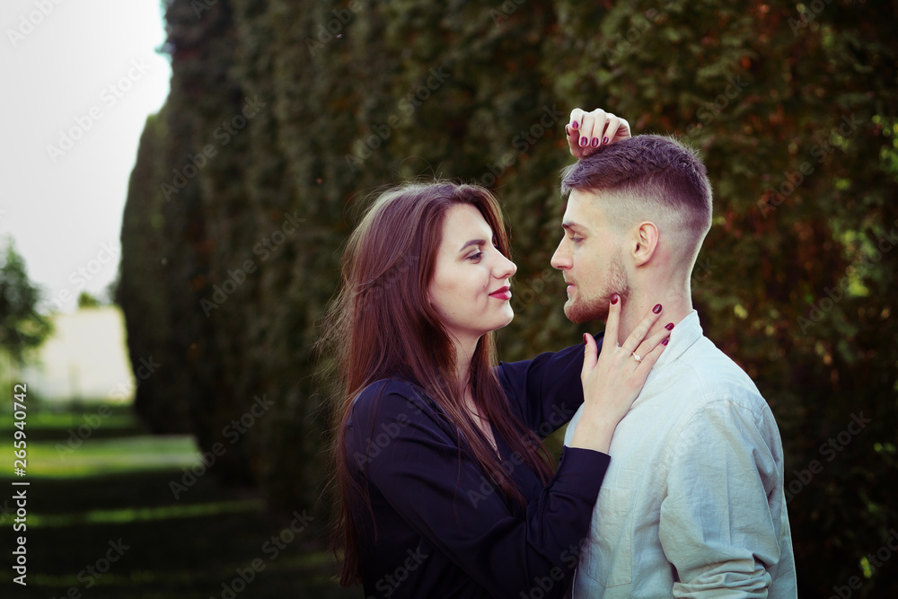 Fototapeta premium Beautiful coule walking outdoors