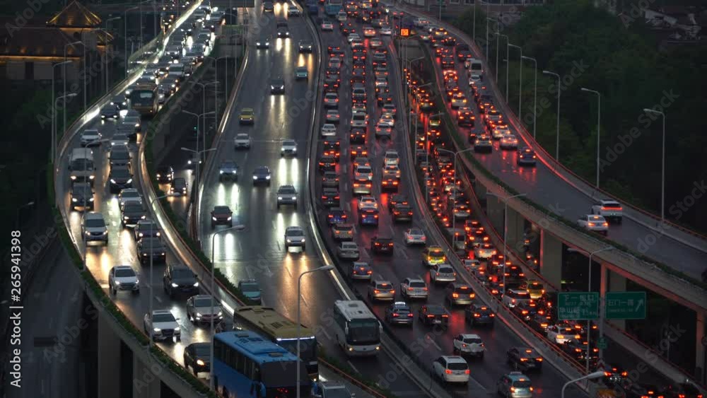 Traffic jam in the rush hour on highway. Cars on bridges and roads in