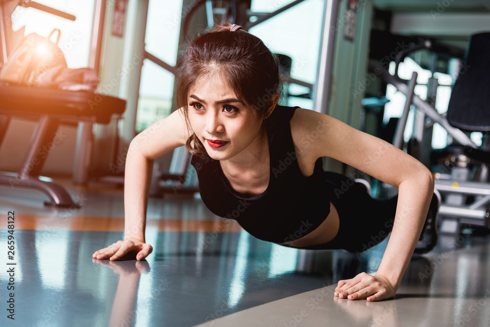 Fototapeta premium Woman healthy training fit exercise plank physical planking workout