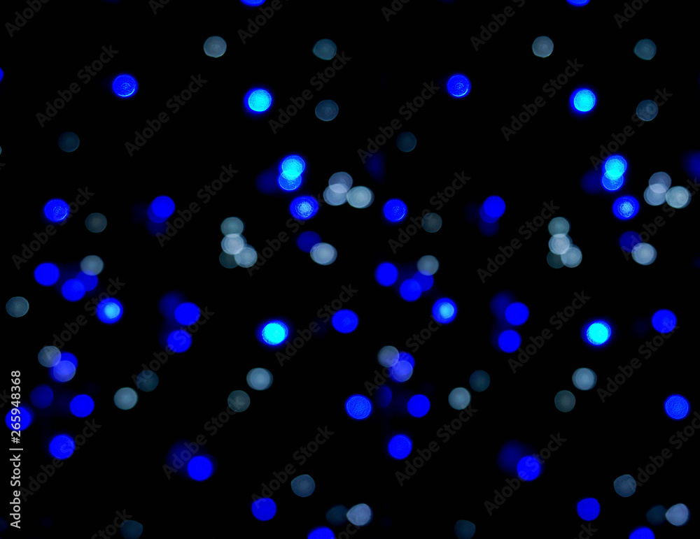 Blue small circles abstract blurred and bokeh of LED party light bubs lighting black background. beautiful like the stars in the night sky. Stock Photo | Adobe Stock