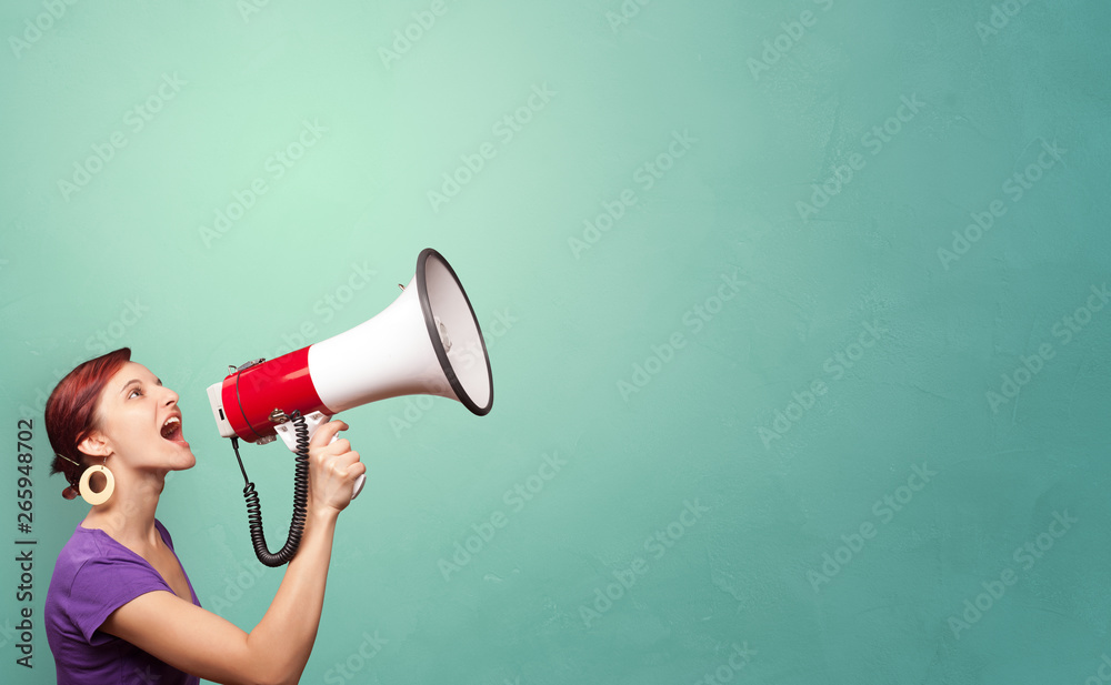 © ra2 studio - Person speaking in loudspeaker