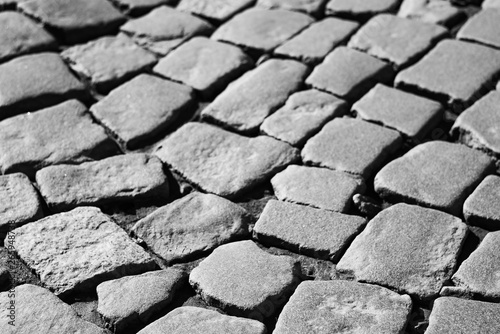 The monochrome old stones paving stones