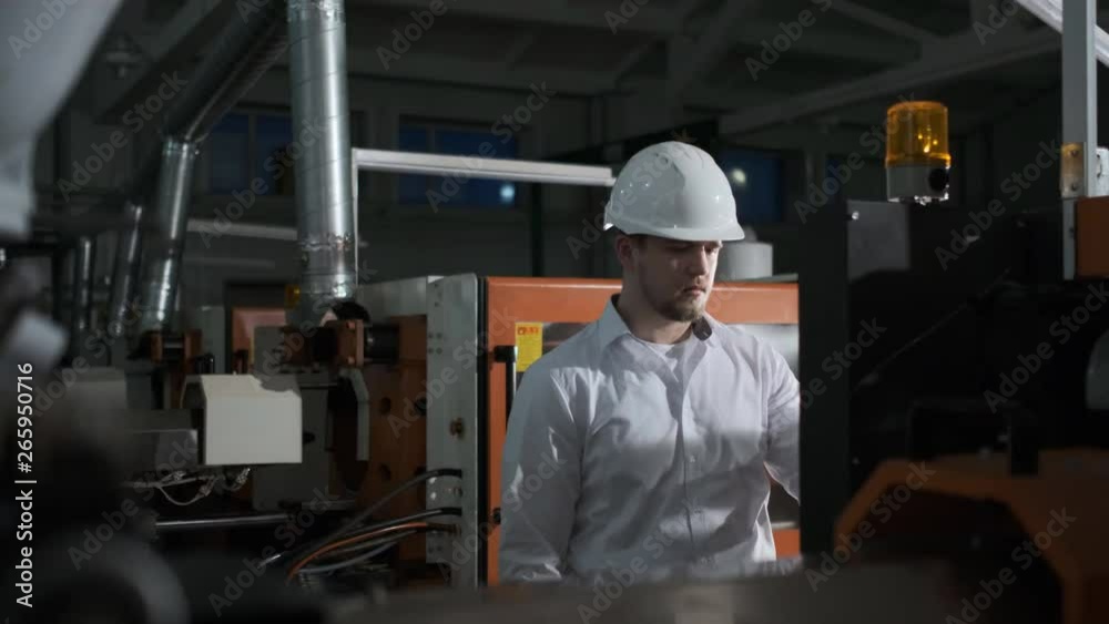 Engineer are Setting Up CNC Lathe Machine. 4K Engineer are Setting Up CNC Lathe Machine. 4K