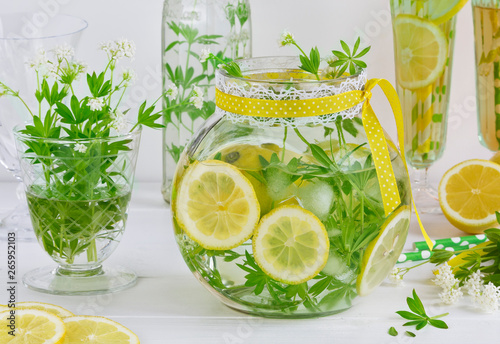 Summer drink blooming woodruff with lemon drink photo