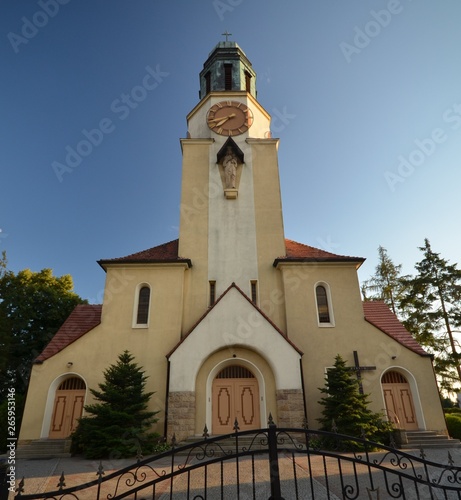 St. Katharina von Alexandria Roman Catholic Church in Dobrzen Wielki, district Opole built 1933-1934 and consecrated on October 4, 1934, in golden sunlight from July 6, 2014, Poland