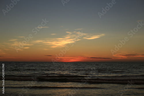 Beautiful sunset over the ocean. © joeyx.j