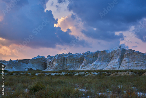 Desert landscape of Gobi Desert  China with a sunset  stones  bushes and the sky. Travel and adventure concept. Ecological tourism