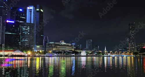Wallpaper Mural Water reflection in Marina Bay Sands harbor of Singapore at night. City lights Torontodigital.ca