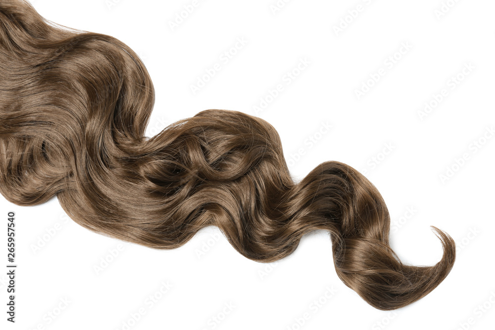 Lock of brown wavy hair on white background, top view Lock of brown wavy hair on white background, top view