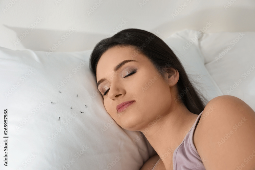 Young woman with eyelash loss problem sleeping in bed. Space for text Young woman with eyelash loss problem sleeping in bed. Space for text