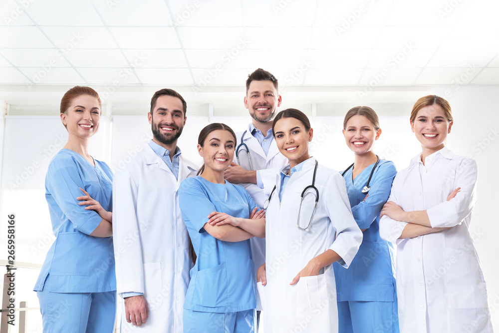 Group of medical doctors at clinic. Unity concept Group of medical doctors at clinic. Unity concept