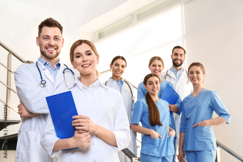 Group of medical doctors at clinic. Unity concept Group of medical doctors at clinic. Unity concept