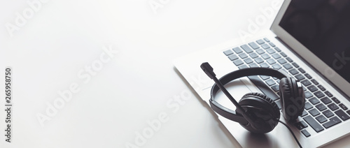 Fototapeta Naklejka Na Ścianę i Meble -  Headset, hotline support concept in office
