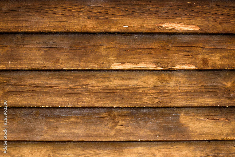 Naklejka premium Old Rough Dark Wooden Wall. Rough wooden background
