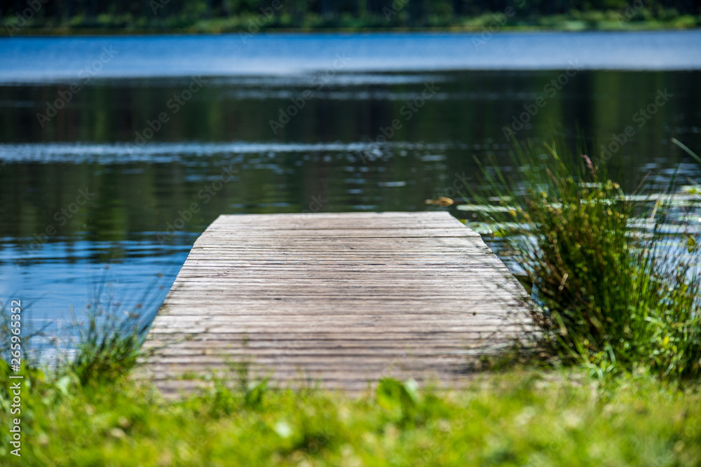 wooden plank foothpath boardwalk trampoline in the lake wooden plank foothpath boardwalk trampoline in the lake
