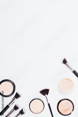Flat lay composition of compact pressed
