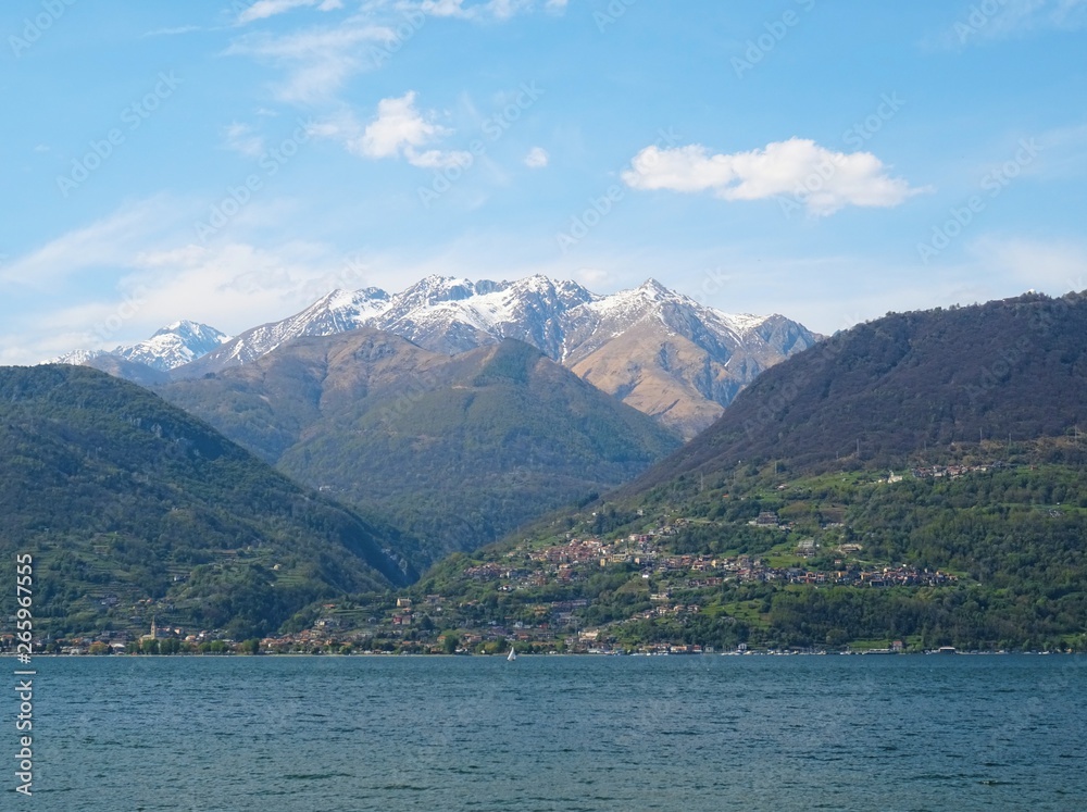 View of Lake Como and the Italian Alps on a spring day, Lombardy - April 2019 View of Lake Como and the Italian Alps on a spring day, Lombardy - April 2019