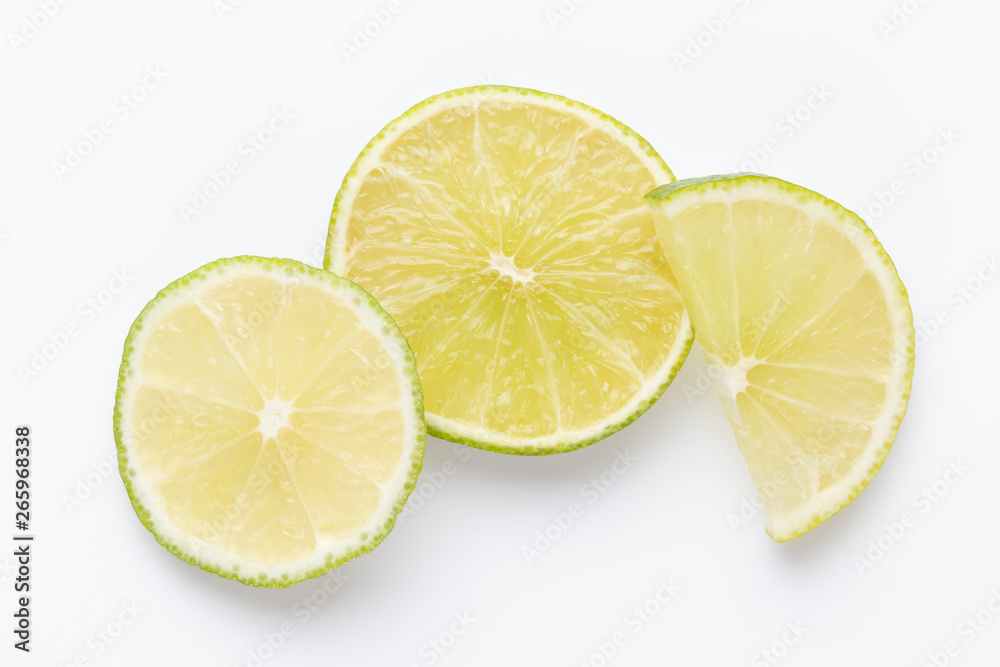 Composition with fresh ripe limes on light background, top view