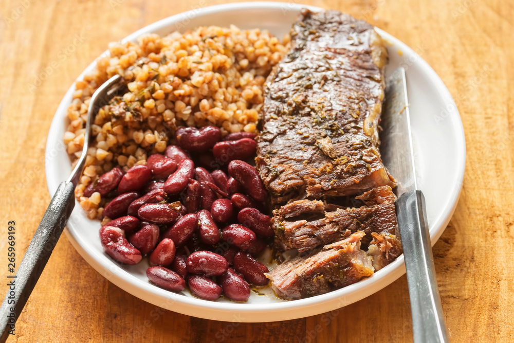 Braised beef steak in red wine with beans & barley Braised beef steak in red wine with beans & barley