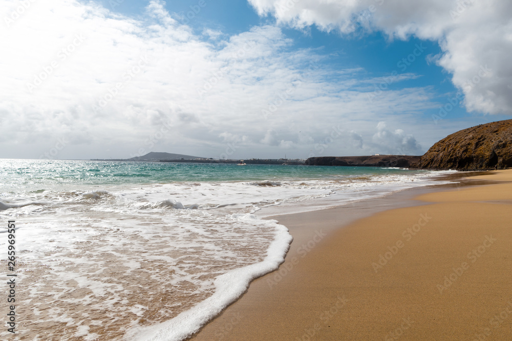 Panorama of beautiful beach and tropical sea of Lanzarote. Canaries Panorama of beautiful beach and tropical sea of Lanzarote. Canaries