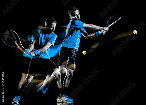 one caucasian tennis player man isolated black background in light painting speed motion multiple exposure © snaptitude