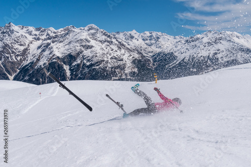 Woman skier accident crash on a ski slope with ski flying, Solden, Austria