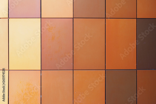 Orange Metal decorative panels for the facade of different shades. Orange texture background