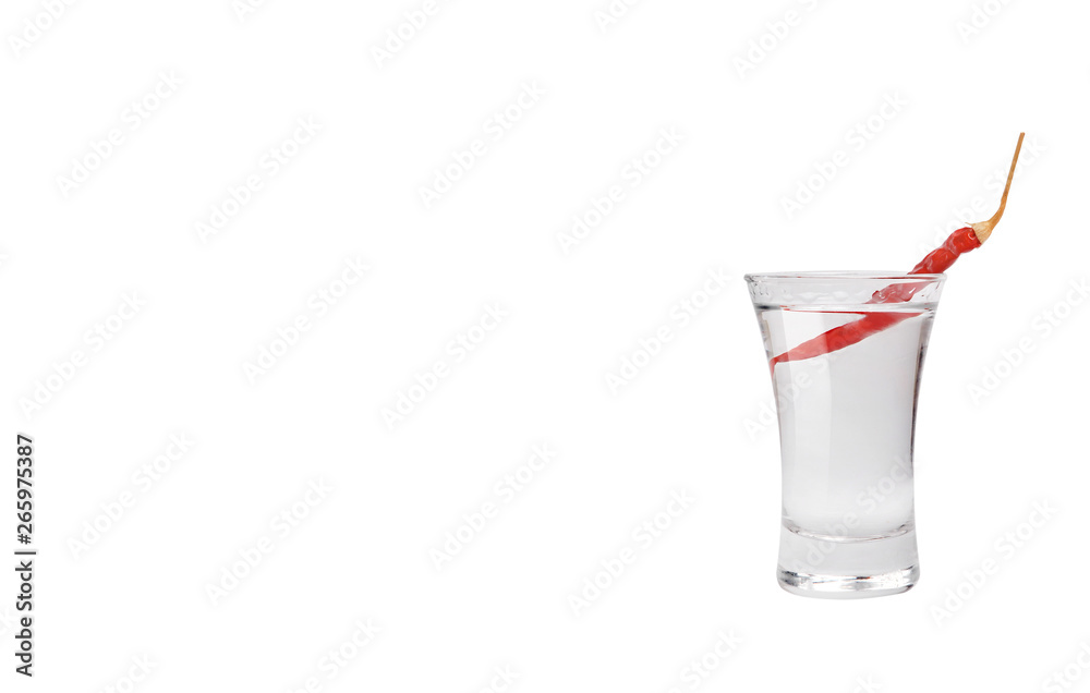 Shot of vodka and red hot chili pepper. Isolated on white background with space for text Shot of vodka and red hot chili pepper. Isolated on white background with space for text