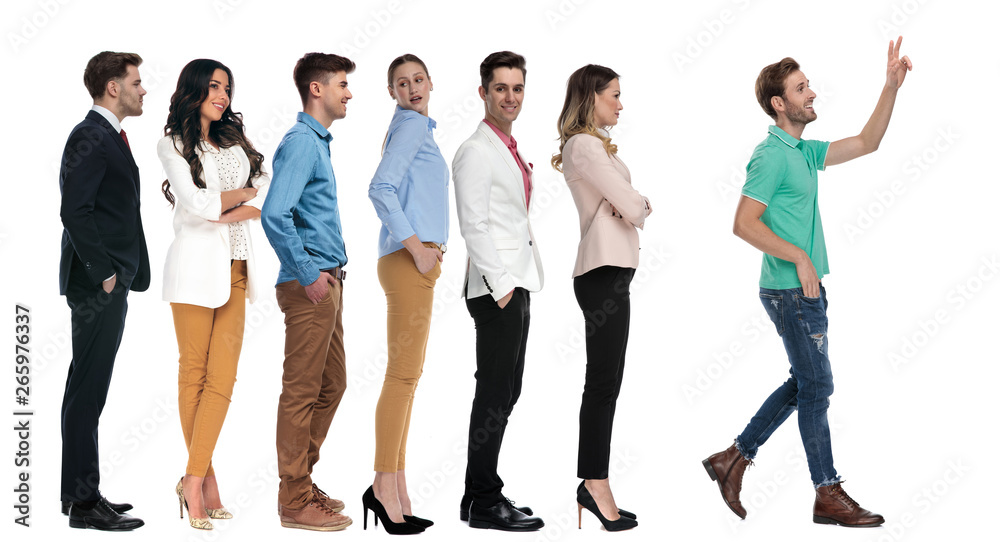 © Viorel Sima - man leaves a line of people and calls for somebody © Viorel Sima - man leaves a line of people and calls for somebody