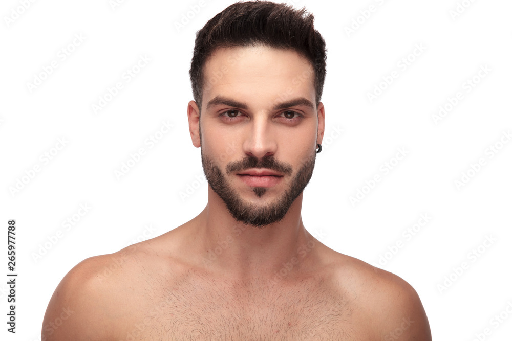 charming undressed man with beard looking to camera charming undressed man with beard looking to camera
