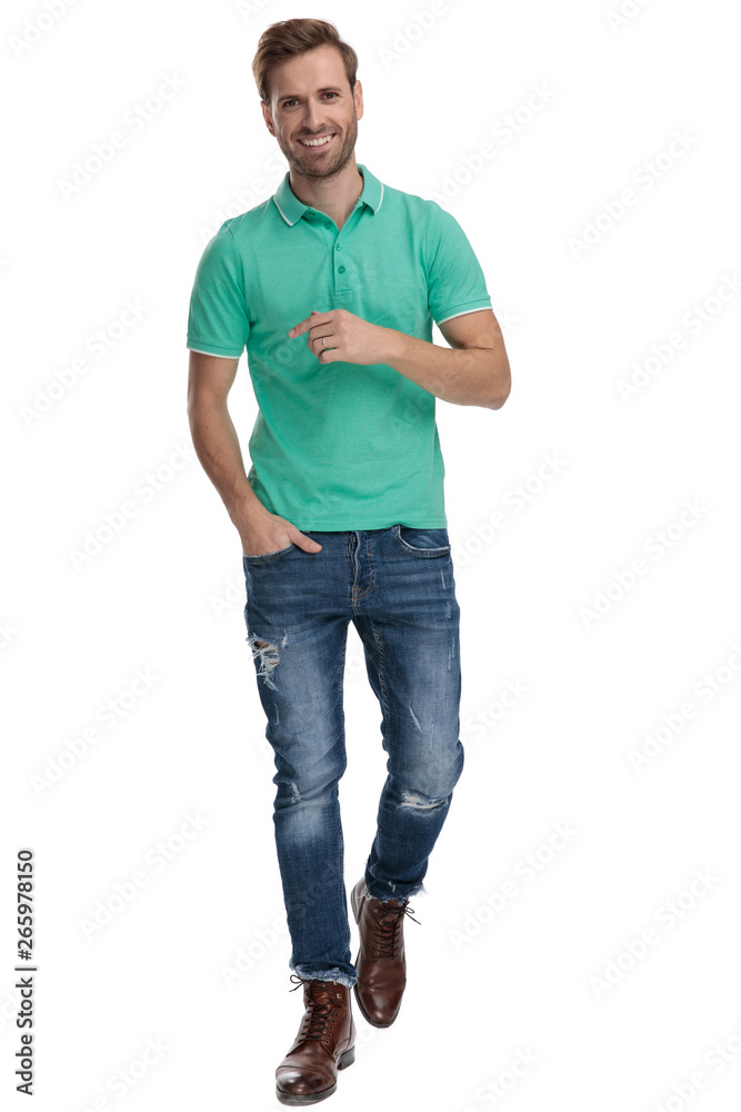 cool man walking with hand in pocket cool man walking with hand in pocket