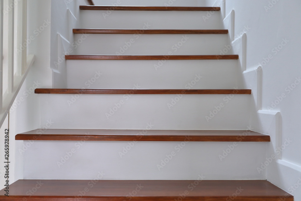 brown wooden stair and white wall in residential house brown wooden stair and white wall in residential house